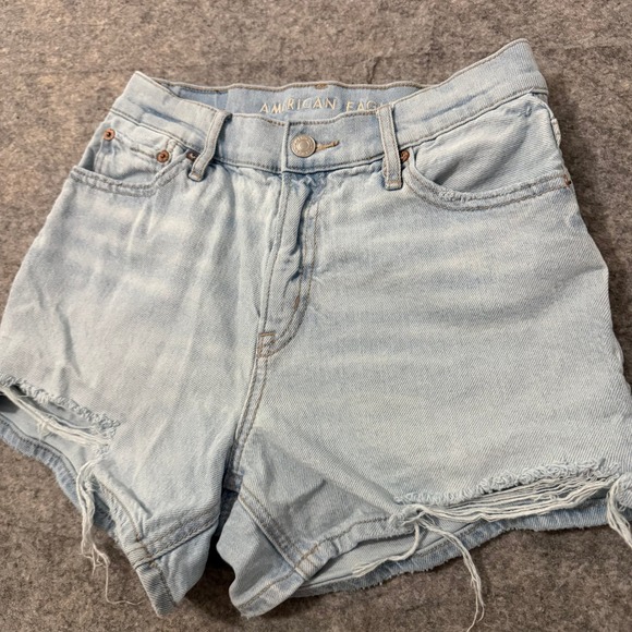 American Eagle Outfitters Pants - American Eagle Strigid Light Wash Mid Waisted Distressed Denim Shorts Size 00
